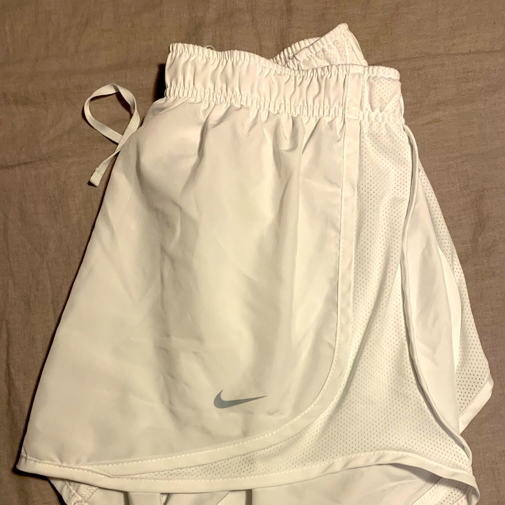 White Nike Dry-Fit women’s shorts